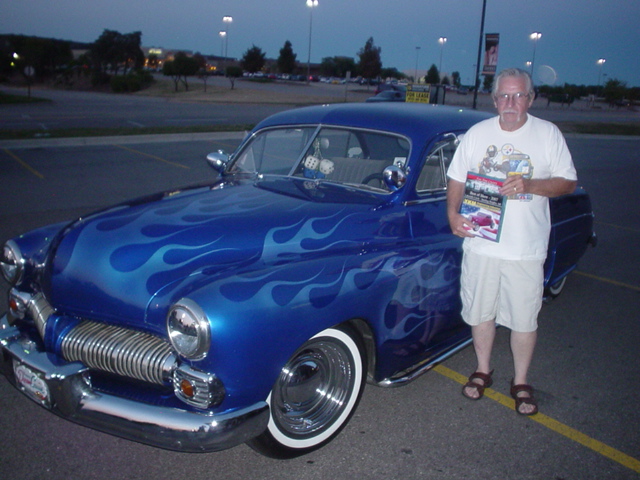 Jim Brown enjoys his YKM BoS plaque for his sharp 1950 Merc.