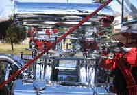 Chevy 355 with Chromed Edelbrock Tunnel Ram, Endura Shine Carburators, Mr. GasketAir Cleaner.