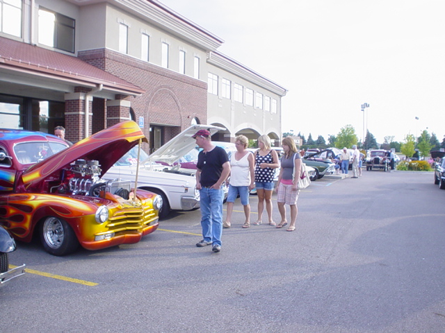 Visitors admire Dan Wheatly's multi-color pro-street beauty.