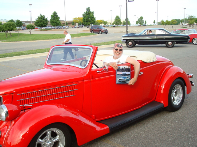 Bert Bernardi wins his award for his awesome 1936 Ford convertible.